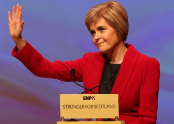 Newly appointed SNP leader Nicola Sturgeon gestures to the audience during her speech at the annual party conference at Perth Concert Hall, Scotland.