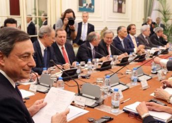 European Central Bank chief Mario Draghi, left, attends a meeting of Portugal's Council of State at the Belem presidential palace in Lisbon, Thursday, April 7 2016. The office of Marcelo Rebelo de Sousa, Portugal's new head of state, said he invited Draghi to the meeting to hear his views on Europe's economic and financial situation. (AP Photo/Armando Franca)