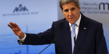 U.S. Secretary of State, John Kerry, gestures during his speech   at the Security Conference in Munich, Germany, Saturday, Feb. 13, 2016. (AP Photo/Matthias Schrader)