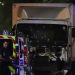 Police officers stand near a van, with its windscreen riddled with bullets, that ploughed into a crowd leaving a fireworks display in the French Riviera town of Nice on July 14, 2016.
Up to 30 people are feared dead and over 100 others were injured after a van drove into a crowd watching Bastille Day fireworks in the French resort of Nice on July 14, a local official told French television, describing it as a "major criminal attack". / AFP PHOTO / VALERY HACHEVALERY HACHE/AFP/Getty Images