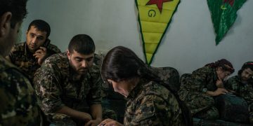 To follow a story on YPG fighters striking ISIS position by Rukmini Callimachi - Hasaka, Syria - July 31, 2015: YPG fighters check maps and location as they coordinate one air strike on ISIS position inside Hasaka, at a YPG headquarters on the outskirts of Hasaka. CREDIT: Photo by Mauricio Lima for The New York Times                              NYTCREDIT: Mauricio Lima for The New York Times