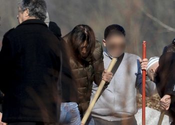 Relatives and friends, including Abid Aberkan (L), attend the burial ceremony of Brahim Abdeslam, one of the attackers of the November 13 Paris attacks, at the interdenominational cemetery of Schaerbeek in Brussels on March 17, 2016.
Aberkan was arrested on March 19 for sheltering key Paris attacks suspect Salah Abdeslam in Molenbeek and charged with "participating in a terrorist group" and hiding a fugitive. / AFP / Belga / STRINGER / Belgium OUT