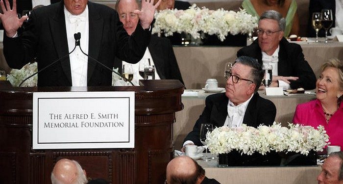 Democratic presidential candidate Hillary Clinton, right, reacts as Republican presidential candidate Donald Trump speaks during the Alfred E. Smith Memorial Foundation dinner, Thursday, Oct. 20, 2016, in New York. (AP Photo/ Evan Vucci)