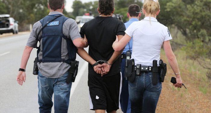 ###LEGAL LEGAL LEGAL### PICTURE BY NIC ELLIS  1 OCTOBER 2014
THE WEST AUSTRALIAN  FAIRFAX AND AUSTRALIAN
FINANCIAL REVIEW OUT
A man under arrest on the Brand Highway north of Muchea, after a police pursuit, when he abandoned the stolen vehicle he was driving.