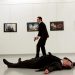 Russian Ambassador to Turkey Andrei Karlov lies on the ground after he was shot by unidentified man at an art gallery in Ankara, Turkey, December 19, 2016. Hasim Kilic/Hurriyet via REUTERS