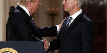 President Donald Trump shakes hands with 10th U.S. Circuit Court of Appeals Judge Neil Gorsuch, his choice for Supreme Court Justices in the East Room of the White House in Washington, Tuesday, Jan. 31, 2017. (AP Photo/Carolyn Kaster)