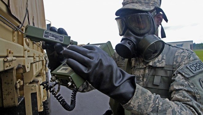 U.S. Army Spc. Jerame Smalls of Mount Pleasant, a chemical operations specialist from the 108th Chemical Company, S.C. Army National Guard in North Charleston, S.C., checks a vehicle for radiation at the first station during a vehicle decontamination exercise in support of Ardent Sentry, May 19, 2013. The S.C. National Guard is participating in a major NORAD and USNORTHCOM training exercise called Ardent Sentry, May 17-21, 2013. It involves a scenario of a hurricane striking the South Carolina coast, requiring more than 1,500 members of the S.C. National Guard to practice disaster response activities and coordination procedures. (U.S. Army National Guard photo by Sgt. Erica Knight/Released)