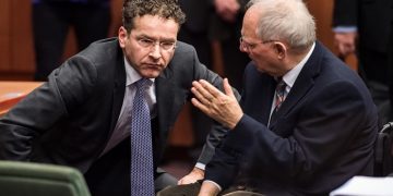 German Finance Minister Wolfgang Schaeuble, right, speaks with Dutch Finance Minister Jeroen Dijsselbloem during a meeting of Eurogroup finance ministers at the EU Council building in Brussels, Monday, Feb. 16, 2015. Greeces radical left government and its European creditors headed into new talks Monday on the debt-heavy countrys stuttering bailout program, but expectations are low despite a fast-approaching deadline for some kind of deal. (AP Photo/Geert Vanden Wijngaert)