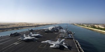 160708-N-QN175-009 SUEZ CANAL (July 8, 2016) - The aircraft carrier USS Dwight D. Eisenhower (CVN 69) approaches the Friendship Bridge as it transits the Suez Canal. The Eisenhower Carrier Strike Group is deployed in support of maritime security operations and theater security cooperation efforts in the U.S. 5th Fleet area of operations. (U.S. Navy photo by Mass Communication Specialist Seaman Dartez C. Williams/Released)