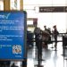 This undated image released by the Transportation Security Administration shows a sign promoting the TSA PreCheck program at at Reagan National Airport in Washington. The Transportation Security Administration's PreCheck program is open to some elite frequent fliers as well as travelers enrolled in one of the Customs & Border Protection's expedited entry programs: Global Entry, Nexus and Sentri. These travelers are considered less of a terrorist risk and therefore don't have to go through as stringent of a screening process.  (AP Photo/TSA)