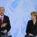 German Chancellor Angela Merkel (R) and Turkish Prime Minister Tayyip Erdogan address the media after talks in Berlin October 31, 2012. REUTERS/Tobias Schwarz (GERMANY - Tags: POLITICS) - RTR39T8F