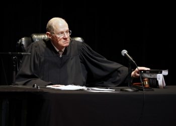 January 31, 2011: U.S. Supreme Court Justice Anthony Kennedy presides over arguments at "The Trial of Hamlet," a Shakespeare Center of Los Angeles representation of Hamlet's trial with a jury of 12 community members, including actors, high school students, philanthropists and Los Angeles dignitaries at the University of Southern California Bovard Auditorium in Los Angeles on Monday, Jan. 31, 2011. (AP Photo/Damian Dovarganes)