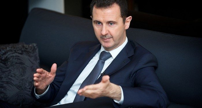 Syria's president Bashar al-Assad gestures during an interview with French daily Le Figaro in Damascus in this handout distributed by Syria's national news agency SANA on September 2, 2013.  REUTERS/SANA/Handout (SYRIA - Tags: CONFLICT CIVIL UNREST POLITICS ) ATTENTION EDITORS - THIS IMAGE WAS PROVIDED BY A THIRD PARTY. FOR EDITORIAL USE ONLY. NOT FOR SALE FOR MARKETING OR ADVERTISING CAMPAIGNS. THIS PICTURE IS DISTRIBUTED EXACTLY AS RECEIVED BY REUTERS, AS A SERVICE TO CLIENTS