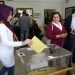 A Turkish woman casts her ballot as she votes in Turkey's general election at a polling station  in a primary school in Ankara on June 7, 2015. Turkey Turkish voters went to the polls on June 7 in a bitterly-contested election set to determine whether President Recep Tayyip Erdogan can tighten his increasingly controversial grip on the country. The legislative election is taking place under the shadow of violence after two people were killed and dozens more wounded in an attack on a rally of the pro-Kurdish People's Democratic Party (HDP) in the southeastern city of Diyarbakir two days prior. AFP PHOTO / ADEM ALTAN