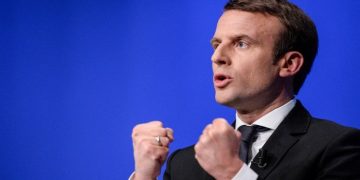 (FILES) This file photo taken on April 11, 2017 in Besancon, eastern France, shows French presidential election candidate for the En Marche ! movement Emmanuel Macron gesturing as he gives a speech during a campaign meeting. French voters will chose on May 7, 2017 between Pro-European centrist Macron and far-right rival, who have offered starkly different visions for France during a campaign closely watched in Europe and the rest of the world. / AFP PHOTO / Sébastien BOZONSEBASTIEN BOZON/AFP/Getty Images