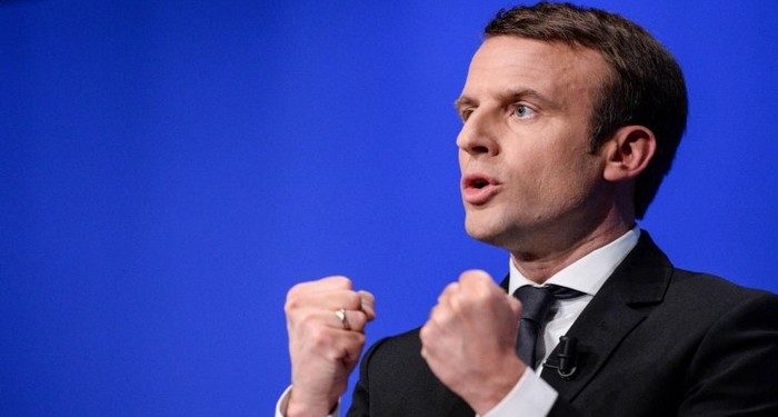 (FILES) This file photo taken on April 11, 2017 in Besancon, eastern France, shows French presidential election candidate for the En Marche ! movement Emmanuel Macron gesturing as he gives a speech during a campaign meeting. French voters will chose on May 7, 2017 between Pro-European centrist Macron and far-right rival, who have offered starkly different visions for France during a campaign closely watched in Europe and the rest of the world. / AFP PHOTO / Sébastien BOZONSEBASTIEN BOZON/AFP/Getty Images