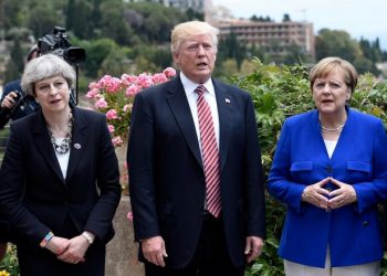 (L-R) Britain's Prime Minister Theresa May, US President Donald Trump and German Chancellor Angela Merkel arrive to watch an Italian flying squadron during the Summit of the Heads of State and of Government of the G7, the group of most industrialized economies, plus the European Union, on May 26, 2017 in Taormina, Sicily. The leaders of Britain, Canada, France, Germany, Japan, the US and Italy will be joined by representatives of the European Union and the International Monetary Fund (IMF) as well as teams from Ethiopia, Kenya, Niger, Nigeria and Tunisia during the summit from May 26 to 27, 2017. / AFP PHOTO / POOL / STEPHANE DE SAKUTINSTEPHANE DE SAKUTIN/AFP/Getty Images