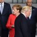 French President Emmanuel Macron (L) and German Chancellor Angela Merkel (2nd L) speaks as US President Donald Trump (C) arrives next to Greek Prime Minister Alexis Tsipras (R) for a family picture during the NATO (North Atlantic Treaty Organization) summit at the NATO headquarters, in Brussels, on May 25, 2017. / AFP PHOTO / Eric FEFERBERG        (Photo credit should read ERIC FEFERBERG/AFP/Getty Images)