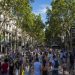 Barcelona, Spain- July 25: Famous street La Rambla in Barcelona, Spain. Thousands of people walk daily by this popular pedestrian area 1.2 kilometer long.