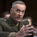 FILE - In this July 9, 2015, file photo, then-Marine Corps Commandant Gen. Joseph Dunford, Jr., testifies during his Senate Armed Services Committee confirmation hearing to become the Chairman of the Joint Chiefs of Staff, on Capitol Hill in Washington. The Marine Corps is expected to ask that women not be allowed to compete for several front-line combat jobs, inflaming tensions between Navy and Marine leaders, U.S. officials say. The tentative decision has ignited a debate over whether Navy Secretary Ray Mabus can veto any Marine Corps proposal to prohibit women from serving in certain infantry and reconnaissance positions. And it puts Dunford, the Marine Corps commandant who takes over soon as chairman of the Joint Chiefs of Staff, at odds with the other three military services, who are expected to open all of their combat jobs to women. (AP Photo/Cliff Owen, File)