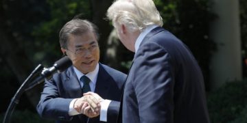 File photo: U.S. President Donald Trump  (R) greets South Korean President Moon Jae-in prior to delivering a joint statement from the Rose Garden of the White House in Washington, U.S., June 30, 2017. REUTERS/Carlos Barria