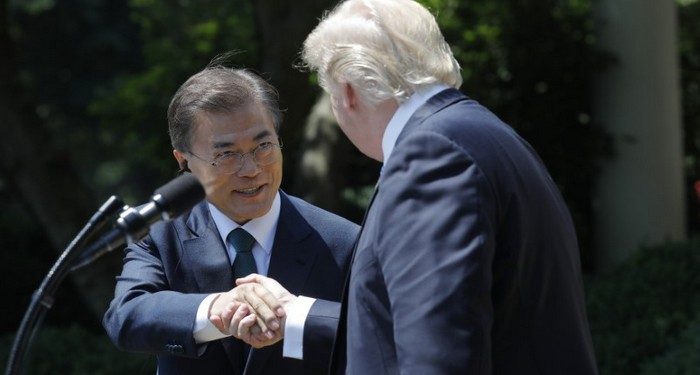 File photo: U.S. President Donald Trump  (R) greets South Korean President Moon Jae-in prior to delivering a joint statement from the Rose Garden of the White House in Washington, U.S., June 30, 2017. REUTERS/Carlos Barria