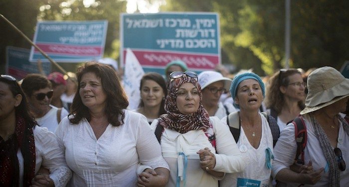 Thousands of women from the 'Women Wage Peace' movement take part in a march in support of peace  in Jerusalem on October 19, 2016. The women have been marching across the country over the past two weeks, culminating in a march from the Knesset to the Prime Minister's House in Jerusalem, demanding a peace agreement between Israel and the Palestinians. Photo by Hadas Parush/Flash90