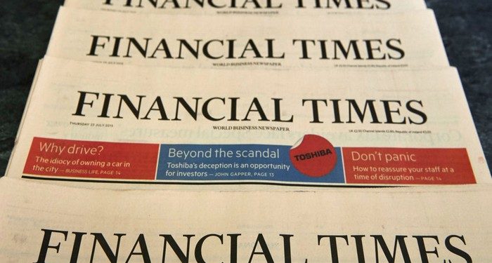 Copies of the July 23, 2015 edition of the Financial Times newspaper are displayed for a photograph in London on July 23, 2015. British publisher Pearson revealed today it is in "advanced" talks to sell its flagship business newspaper the Financial Times to an unnamed suitor.   AFP PHOTO / NIKLAS HALLE'N        (Photo credit should read NIKLAS HALLE'N/AFP/Getty Images)