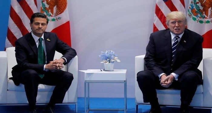 U.S. President Donald Trump meets Mexico's President Enrique Pena Nieto during the their bilateral meeting at the G20 summit in Hamburg, Germany July 7, 2017.    REUTERS/Carlos Barria