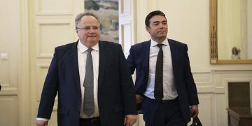 Macedonian Foreign Minister Nikola Dimitrov, right, walks next to Greek Foreign Minister Nikos Kotzias during their meeting in Athens, Wednesday, June 14, 2017. Dimitrov is in Greece on a one day official visit. (AP Photo/Petros Giannakouris)