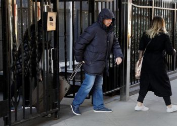 People depart the Permanent Mission of the Russian Federation to the United Nations in Manhattan on Monday. REUTERS/Mike Segar