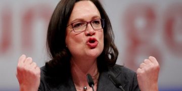 BERLIN, GERMANY - DECEMBER 07: Andrea Nahles (R), leader of the of the German Social Democrats (SPD) Bundestagsfaction, speaks at the SPD federal party congress on December 7, 2017 in Berlin, Germany. SPD delegates are meeting for the three-day congress to elect party leadership and also to vote on whether to pursue coalition negotiations with the German Christian Democrats (CDU/CSU). The CDU and CSU had pursued coalition talks with the German Greens Party and the Free Democratic Party (FDP), though those talks collapsed in November. Schulz and other SPD leaders had vowed the party would not seek a coalition with the Christian Democrats and would instead remain in the opposition following federal elections last September, though the November coalition talks collapse has led many in the SPD to reconsider. (Photo by Carsten Koall/Getty Images)