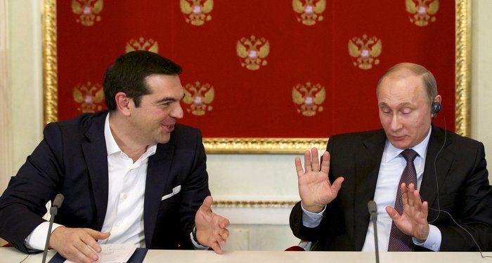 Russian President Vladimir Putin (R) and Greek Prime Minister Alexis Tsipras attend a signing ceremony at the Kremlin in Moscow, April 8, 2015. Greek Prime Minister Alexis Tsipras did not ask for financial aid at talks in Moscow on Wednesday but Russia could provide credits for large joint projects in the future, President Vladimir Putin said. REUTERS/Alexander Zemlianichenko/Pool       TPX IMAGES OF THE DAY