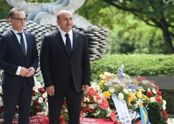 Turkish Foreign Minister Mevlut Cavusoglu (R) and German Foreign Minister Heiko Maas take part on May 29, 2018 in a ceremony at a memorial in Solingen to mark the 25th anniversary of an arson attack that killed five people of Turkish origin. - Germany remembered the five ethnic Turkish victims of a murderous neo-Nazi arson attack 25 years ago, amid warnings of resurgent German xenophobia and simmering bilateral tensions ahead of Turkish elections. (Photo by PATRIK STOLLARZ / AFP)        (Photo credit should read PATRIK STOLLARZ/AFP/Getty Images)