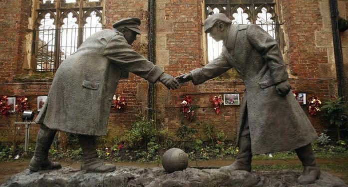 A resin sculpture, called "All Together Now", by artist Andrew Edwards, and depicting the Christmas Day football match between German and British soldiers fighting on the front line in World War One in 1914, is seen after being unveiled in the remains of St Luke's Church in Liverpool, northern England in this December 15, 2014 file photo. REUTERS/Phil Noble/Files