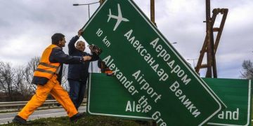 epa06560228 Workers remove a board with the sign for the airport Alexandar the Great near Skopje, The Former Yugoslav Republic of Macedonia, 24 February 2018. The Former Yugoslav Republic Of Macedonian public eagerly awaits the outcome of the intensive negotiations between the Macedonian and Greek governments regarding the problem of the name of the country. The country has been stuck with years in the effort to become a member of the NATO and EU because of the problem that Greece has about the name of the country. The FYROM Government made a decision to rename the Alexander the Great Airport to 'Skopje International airport' and Highway Alexander of Macedonia Highway leading to the Greek border to 'Friendship Highway'. Former Yugoslav Republic of Macedonia (FYROM) and Greece are seeking a solution in a dispute over Macedonia's name. Greece insists that FYROM's name implies territorial claims to its own northern province, called Macedonia.  EPA/GEORGI LICOVSKI