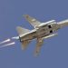 A Sukhoi Su-24 jet fighter drops flares during a joint Kazakh-Russian millitary exercise at Otar millitary range, some 150 km (93 miles) west of Almaty October 3, 2008.  REUTERS/Shamil Zhumatov (KAZAKHSTAN) - RTX96LP