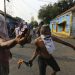 Opposition demonstrators clash with the Bolivarian National Guard in Urena, Venezuela, near the border with Colombia, Saturday, Feb. 23, 2019. Venezuela's National Guard fired tear gas on residents clearing a barricaded border bridge between Venezuela and Colombia on Saturday, heightening tensions over blocked humanitarian aid that opposition leader Juan Guaido has vowed to bring into the country over objections from President Nicolas Maduro(AP Photo/Fernando Llano)