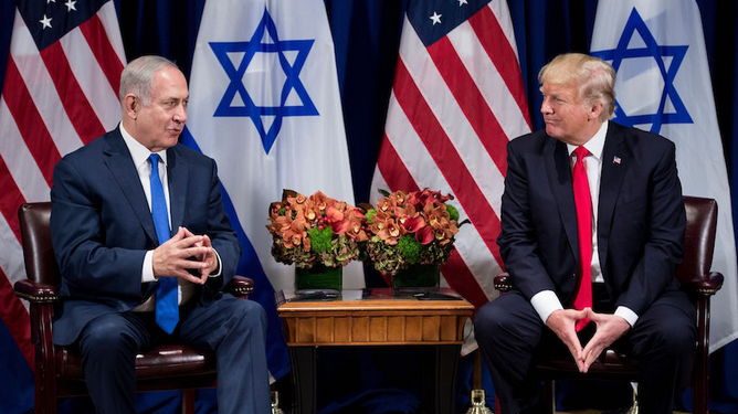 US President Donald Trump listens while Israel's Prime Minister Benjamin Netanyahu makes a statement for the press before a meeting at the Palace Hotel during the 72nd session of the United Nations General Assembly on September 18, 2017, in New York. / AFP PHOTO / Brendan Smialowski        (Photo credit should read BRENDAN SMIALOWSKI/AFP/Getty Images)