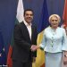 Greek Prime Minister Alexis Tsipras, left, shakes hands with his Romanian counterpart Viorica Dancila, during a meeting of the heads of government of Greece, Bulgaria, Romania and Serbia, at the northern port city of Thessaloniki , Greece, on Wednesday, July 4, 2018. (AP Photo/Giannis Papanikos)