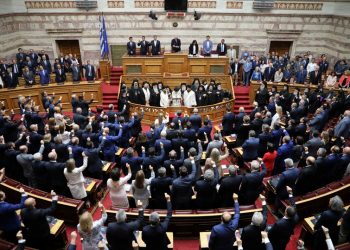 Leader of the Greek Orthodox church Archbishop Ieronimos blesses lawmakers during a swearing-in ceremony at the Greek parliament in Athens, Greece, July 17, 2019. REUTERS/Alkis Konstantinidis