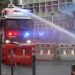 epaselect epa07792203 An anti-riot police vehicle equipped with a water cannon clears the road from a barricade set up by protesters during an anti-government rally in Kwai Fung and Tsuen Wan, Hong Kong, China, 25 August 2019. The protests were triggered last June by an extradition bill to China, now suspended, and evolved into a wider anti-government movement with no end in sight.  EPA/JEROME FAVRE