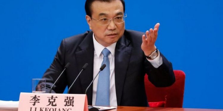 epa06615196 Chinese Premier Li Keqiang gestures as he speaks to reporters during press conference after the closing of the first session of the 13th National People's Congress (NPC) at the Great Hall of the People in Beijing, China, 20 March 2018. The NPC has over 3,000 delegates and is the world's largest parliament or legislative assembly though its function is largely as a formal seal of approval for the policies fixed by the leaders of the Chinese Communist Party. The NPC runs alongside the annual plenary meetings of the Chinese People's Political Consultative Conference (CPPCC), together known as 'Lianghui' or 'Two Meetings'.  EPA/ROMAN PILIPEY