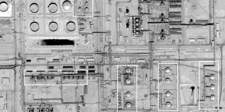 This image provided on Sunday, Sept. 15, 2019, by the U.S. government and DigitalGlobe and annotated by the source, shows a pre-strike overview at Saudi Aramco's Abaqaiq oil processing facility in Buqyaq, Saudi Arabia. The drone attack Saturday on Saudi Arabia's Abqaiq plant and its Khurais oil field led to the interruption of an estimated 5.7 million barrels of the kingdom's crude oil production per day, equivalent to more than 5% of the world's daily supply. (U.S. government/Digital Globe via AP)