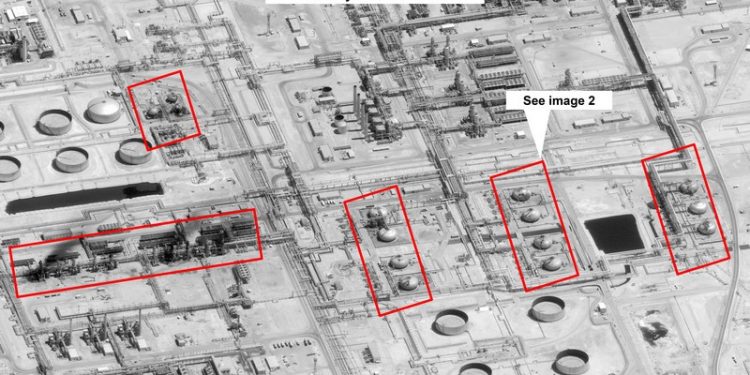 This image provided on Sunday, Sept. 15, 2019, by the U.S. government and DigitalGlobe and annotated by the source, shows damage to the infrastructure at Saudi Aramco's Abaqaiq oil processing facility in Buqyaq, Saudi Arabia. The drone attack Saturday on Saudi Arabia's Abqaiq plant and its Khurais oil field led to the interruption of an estimated 5.7 million barrels of the kingdom's crude oil production per day, equivalent to more than 5% of the world's daily supply. (U.S. government/Digital Globe via AP)