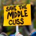 A protest sign reading "Save the Middle Class".