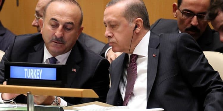 President Recep Tayyip Erdogan of Turkey speaks with his Foreign Minister Mevlut Cavusoglu (L) during the 71st United Nations General Assembly in Manhattan, New York, U.S. September 20,  2016. REUTERS/Carlo Allegri - RTSOLUH