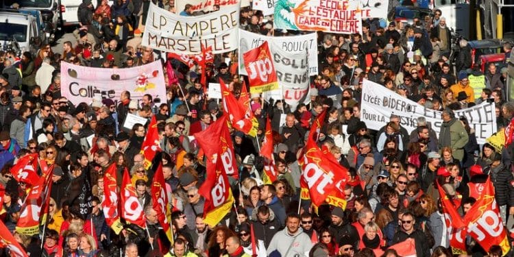 French CGT labour union workers and teachers on strike attend a demonstration against French government's pensions reform plans in Marseille as part of a second day of national strike and protests in France, December 10, 2019.  REUTERS/Jean-Paul Pelissier