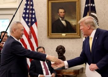 President Trump shakes hands with Chinese Vice Premier Liu He at the White House after announcing a "phase one" trade agreement with China on Oct. 11, 2019. The two leaders are meeting again in Washington on Wednesday to sign the deal.