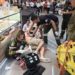 EDITORS NOTE: Graphic content / This photograph taken on January 9, 2020 and received from ViralPress shows paramedics helping a man wounded during a robbery at the Robinson shopping mall in the town of Lopburi, some 150 miliometres (90 miles) north of Bangkok. - A masked gunman killed three people including a two-year-old child and wounded four after shooting up and robbing a gold shop at the mall in central Thailand, police said on January 10. (Photo by STR / ViralPress / AFP) / MANDATORY CREDIT: ViralPress